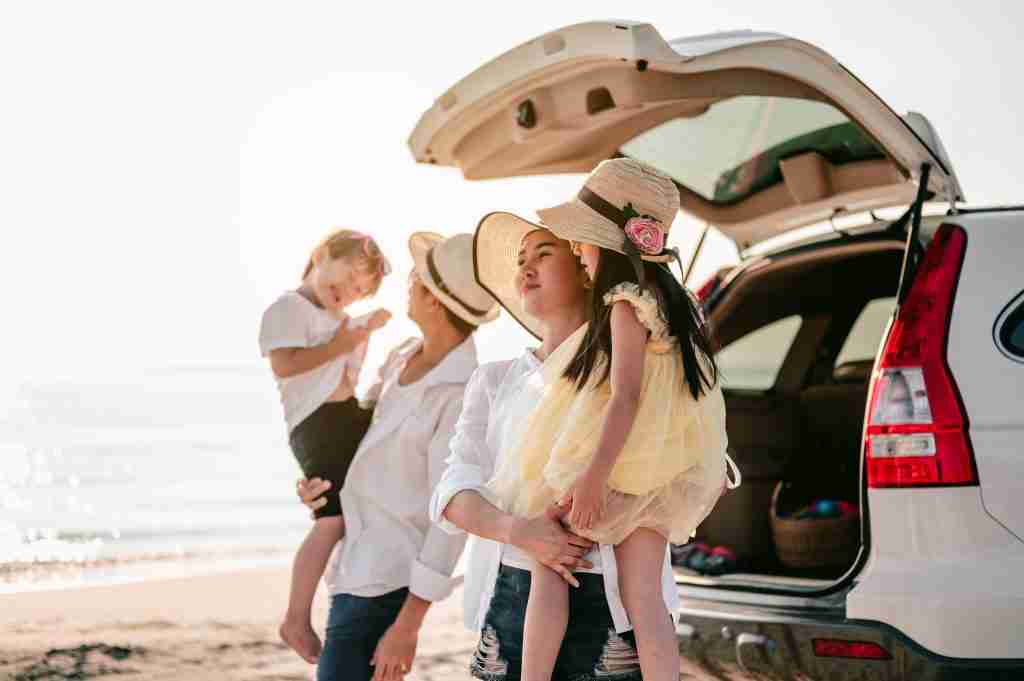 happy asian family on a road trip in their car da 2022 10 28 21 31 08 utc