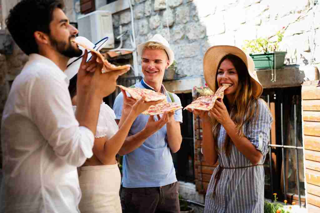 happy people eating fast food in city while travel 2022 07 21 23 55 46 utc